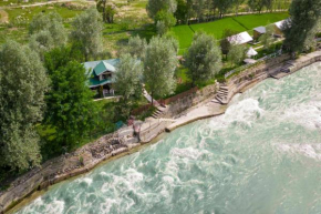 StayVista at Water's Edge with Sprawling Riverside Views